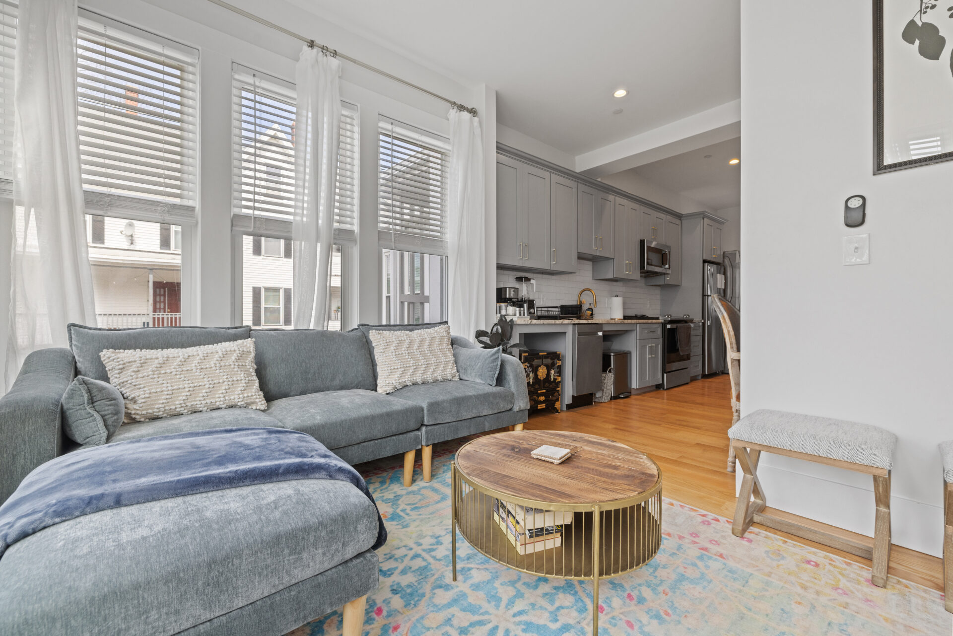 A room with couches and windows