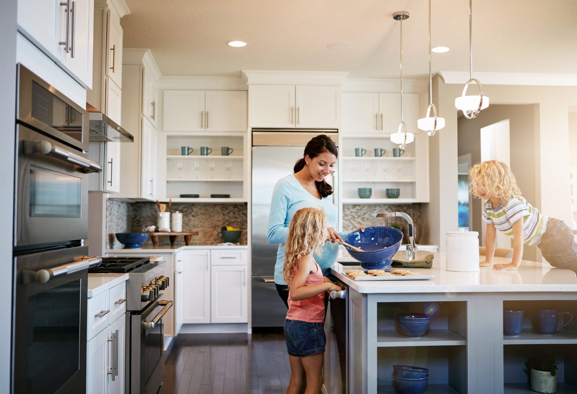 Mother and child cooking in the kitchen.