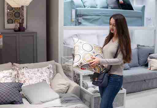 Woman buying furniture at a store